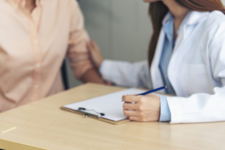 Close up hands Woman doctor holding hands patient